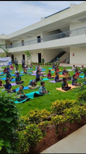 Copy of Group yoga session on the school campus. 1