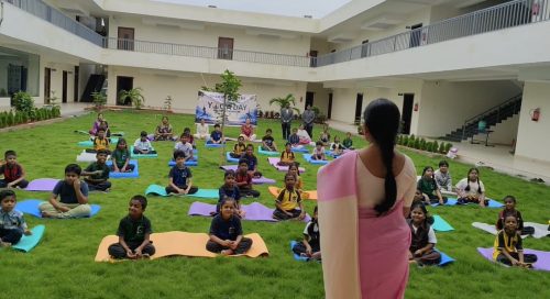 Copy of Principal addressing students on the importance of yoga.
